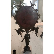 Circular mirror with two angels